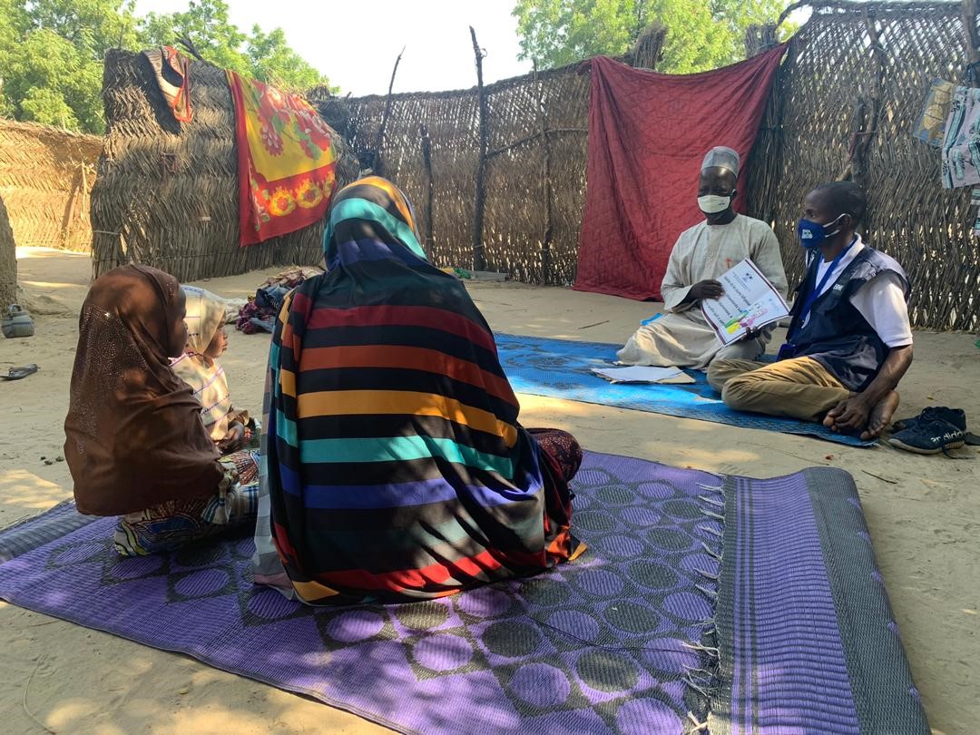 REBHI volunteers conducting house-to-house sensitization on GBV behavior change